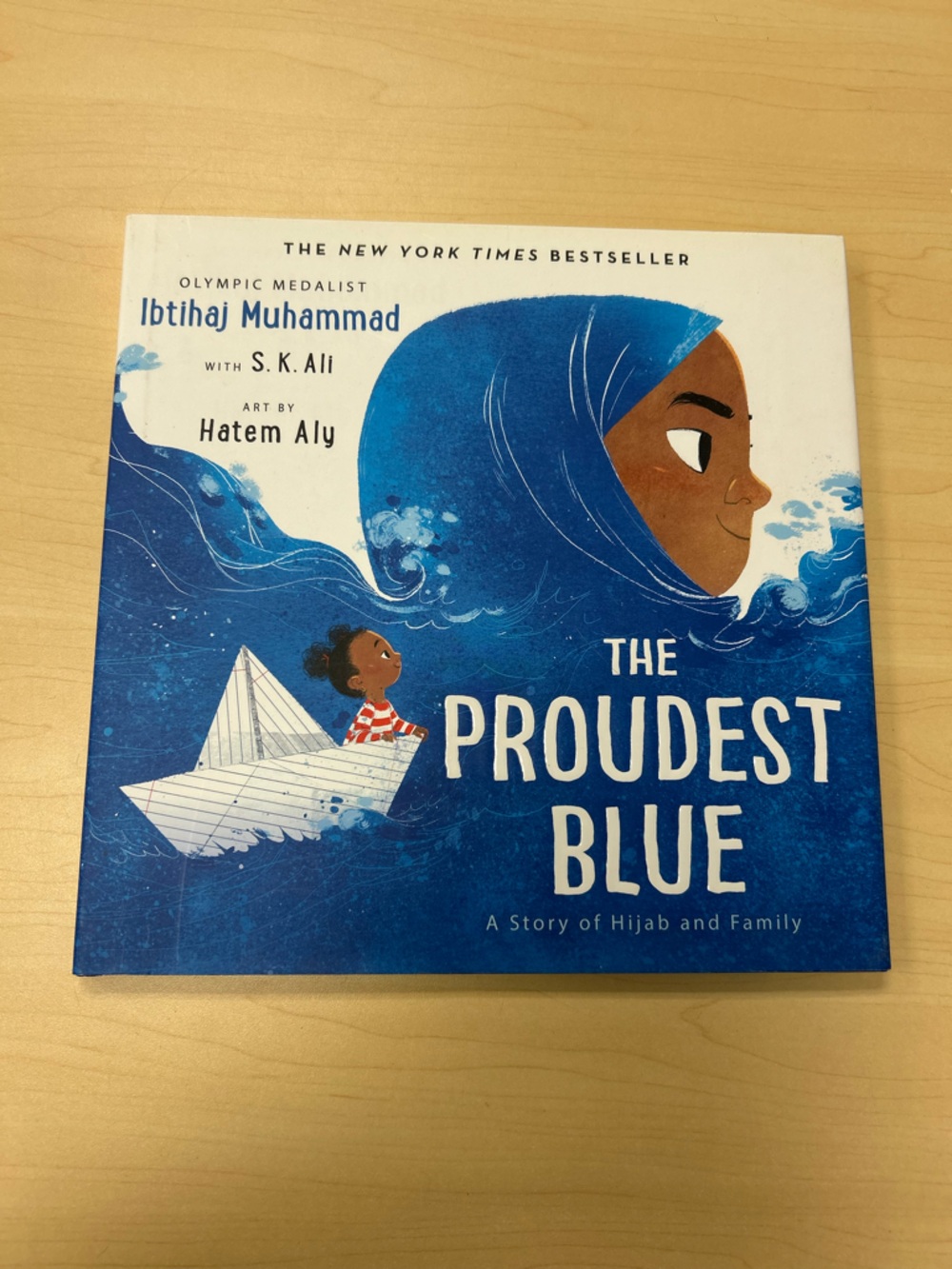 📚 The Proudest Blue – Ibtihaj Muhammad (Hardcover)